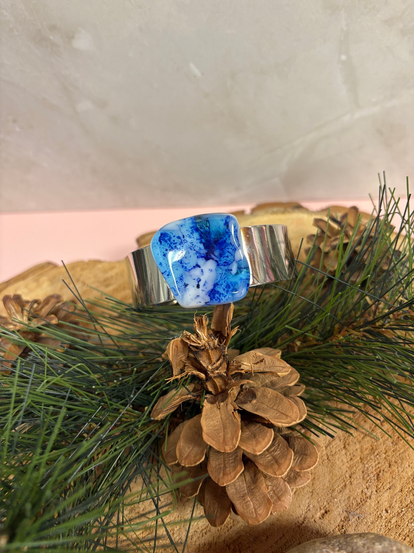 Fused Glass-blue with white irregular shaped glass on a cuff bracelet