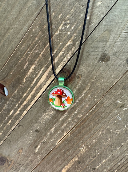 Mushroom Cabochon Pendant on a Black Cord Necklace